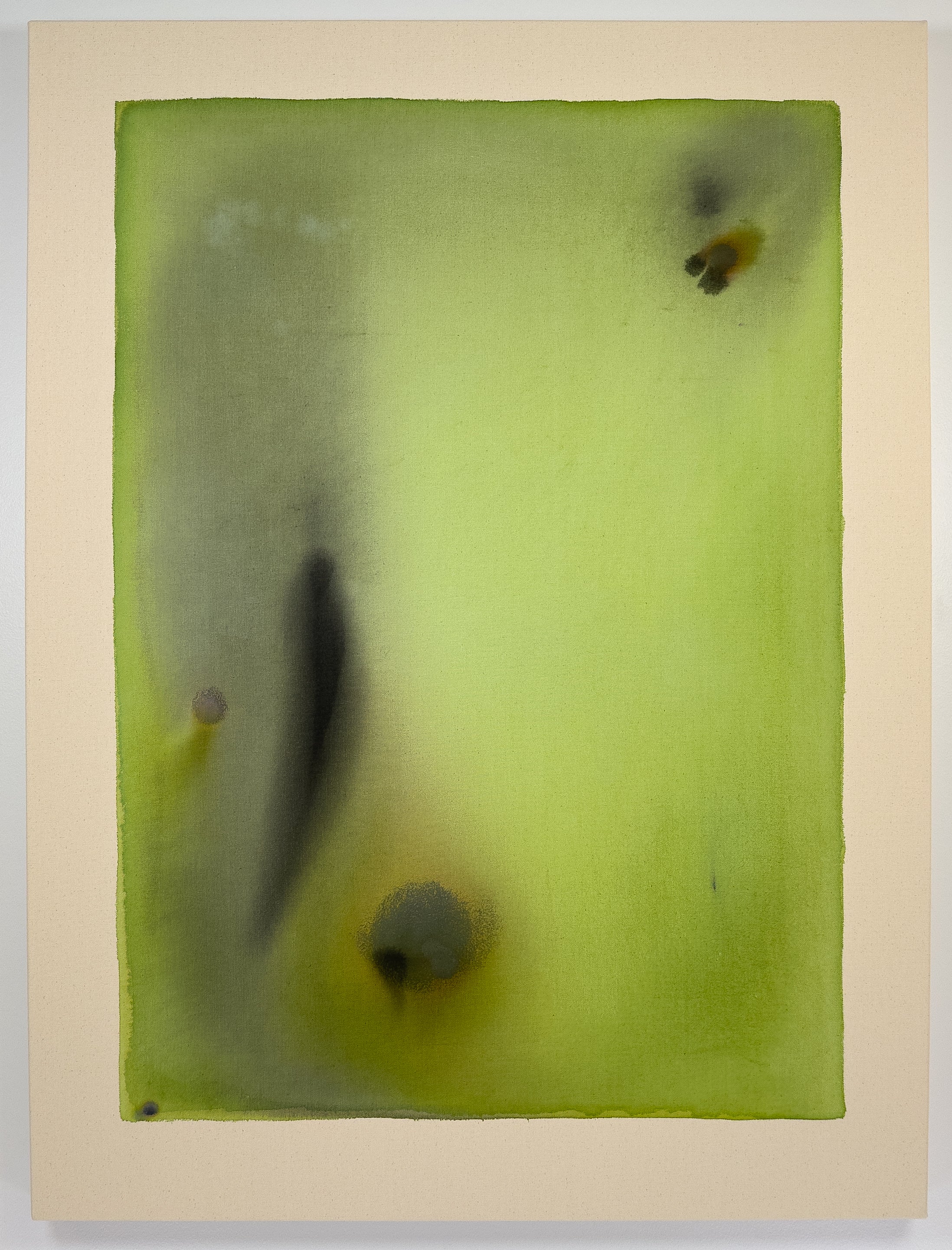 Abstract art piece with green and black colors on a beige background