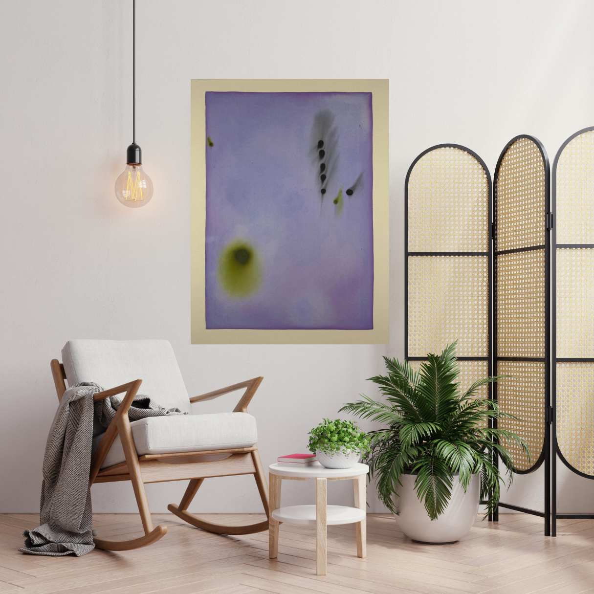 Modern living room with a rocking chair, plant, and abstract art on the wall.