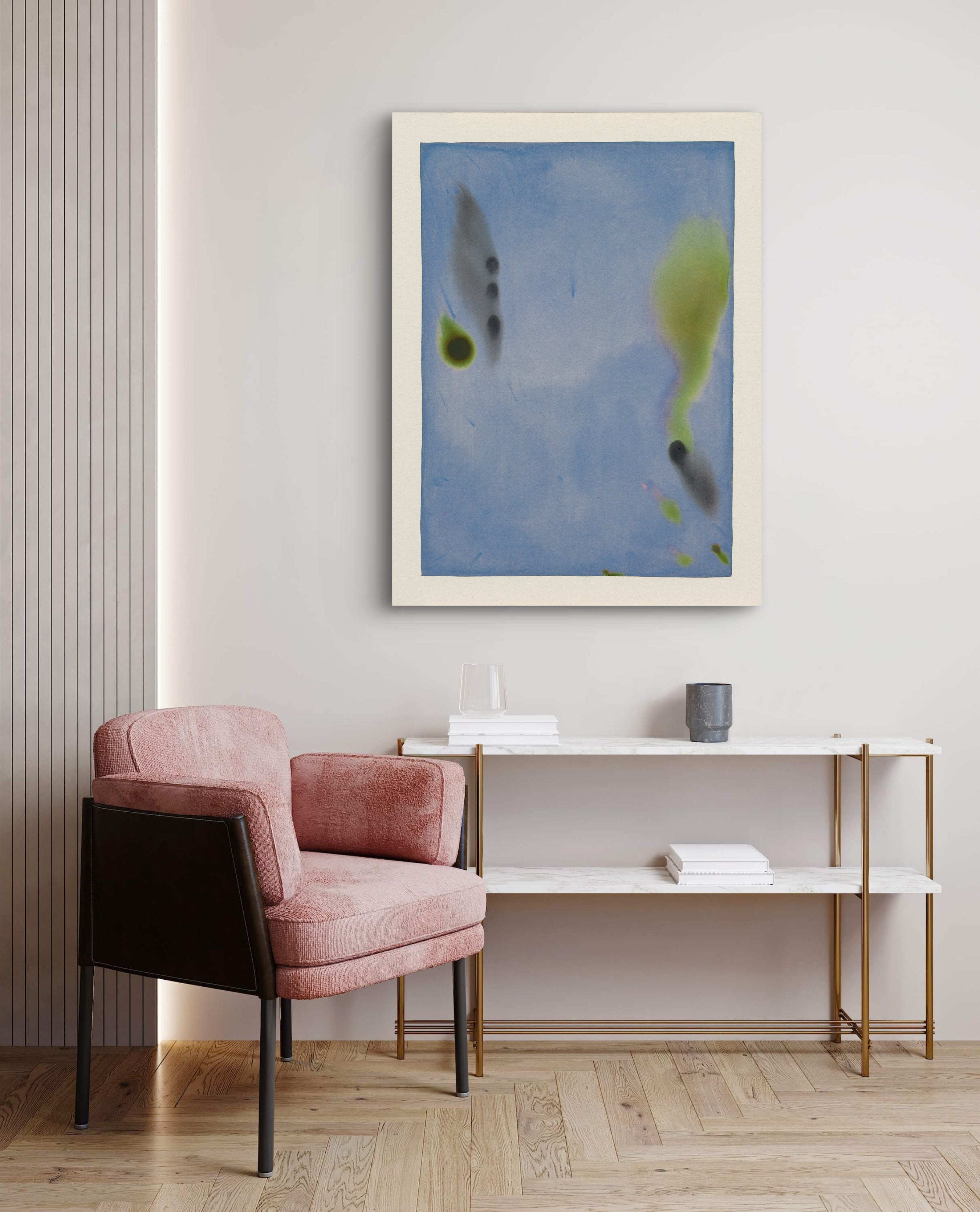 Modern interior with a pink armchair, white console table, and abstract artwork on the wall.